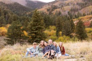 Family of six standing at Ute Valley Park in Colorado Springs for their family portrait photo session